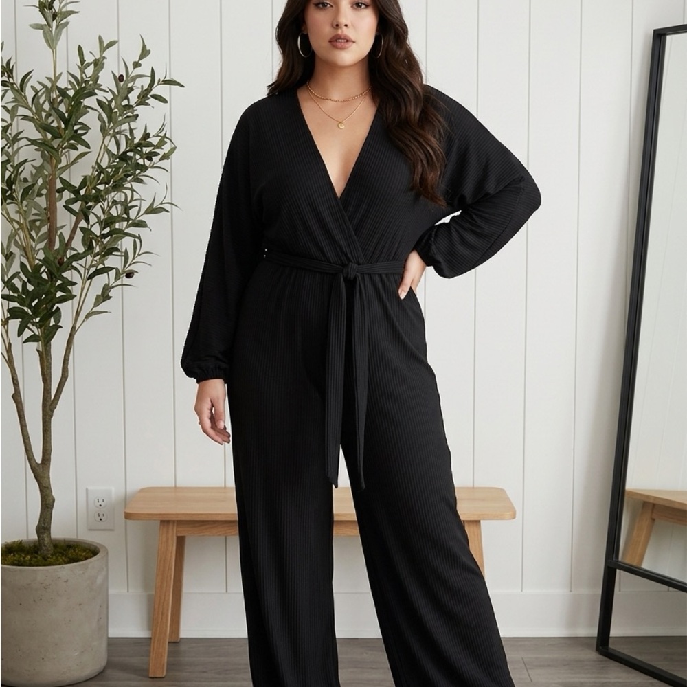 NWT  2X Follow Me Brand black wrap jumpsuit 
Stretchy and comfortable fabric